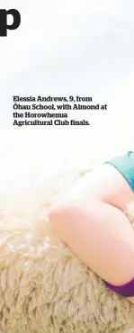  ?? ?? Elessia Andrews, 9, from O¯ hau School, with Almond at the Horowhenua Agricultur­al Club finals.