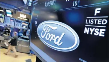  ?? Richard Drew Associated Press ?? FORD MOTOR shares have fallen nearly 40% in the three years since Mark Fields became CEO. Barclay’s analyst Brian Johnson says Ford’s stock has suffered because the company isn’t making splashy moves.