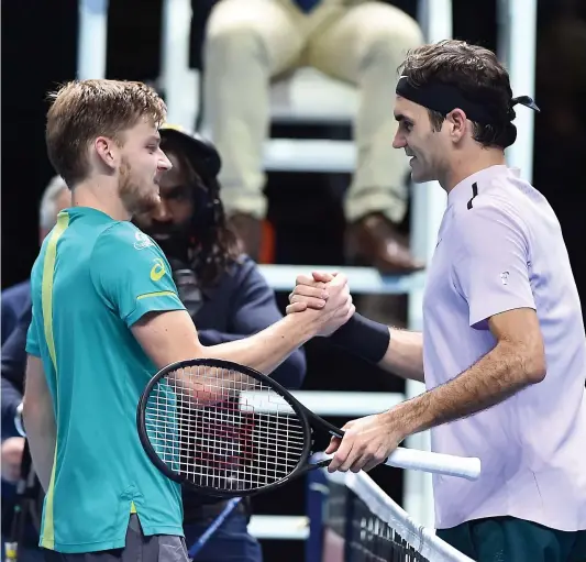  ?? PHOTO AFP ?? David Goffin atteint sa première finale du Masters en remportant un premier duel face à Roger Federer.