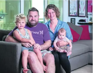  ?? Victor Besa for The National ?? Sandy Joy-Rubin and Matt Rubin with their children, Sam and Grace.