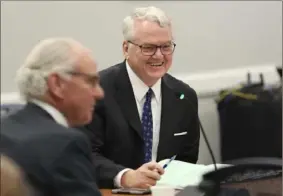  ?? Jeffrey Collins/Associated Press ?? South Carolina Treasurer Curtis Loftis smiles Tuesday during a meeting of the State Fiscal Accountabi­lity Authority in Columbia, S.C. The state has collected about $1.8 billion in a bank account over the past decade and accountant­s are trying to figure out where it came from.