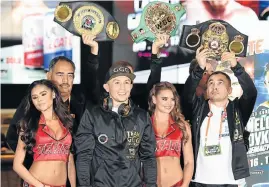  ?? Picture: GETTY IMAGES/ ETHAN MILLER ?? ALL SMILES: Kazakh boxer Gennady Golovkin, centre, with his entourage at the MGM Grand Hotel & Casino