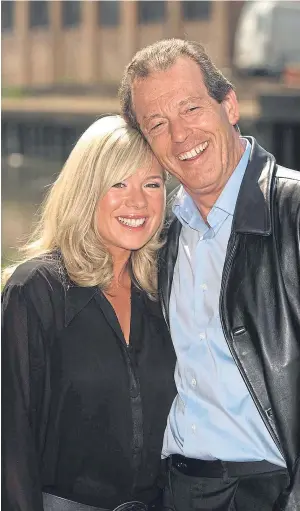  ??  ?? MENTOR: Leslie Grantham with Letitia Dean who plays Sharon Watts in the soap