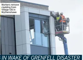  ??  ?? Workers remove cladding from Village 135 in Wythenshaw­e