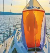  ??  ?? This style of Windscoop works well in the Mediterran­ean, but a type that allows the hatch to be closed is more convenient for use in the tropics when showers may be encountere­d at night