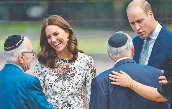  ?? Picture: GETTY ?? Prince William, the Duke of Cambridge, and Catherine, the Duchess of Cambridge, meet former prisoners of the Stutthof concentrat­ion camp in Poland.