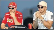  ?? AP ?? Sebastian Vettel and Lewis Hamilton (right).