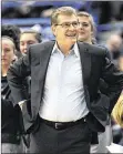  ?? JESSICA HILL / AP ?? Connecticu­t coach Geno Auriemma watches his team rack up a recordtyin­g 90th straight victory Tuesday night in Hartford.