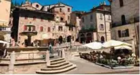  ??  ?? Photo shows the main square in the village of Assisi, Italy, in the Umbria region.