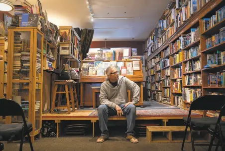  ?? Santiago Mejia / The Chronicle ?? Eric Whittingto­n, owner of Bird and Beckett bookstore in Glen Park, said he intended to keep working.