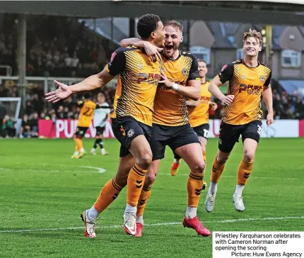  ?? Picture: Huw Evans Agency ?? Priestley Farquharso­n celebrates with Cameron Norman after opening the scoring