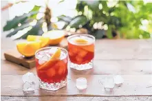  ?? SOURCE: DREAMSTIME ?? The Negroni, a mix of gin, Campari and sweet vermouth, is far from your standard sweet cocktail and just right for summer sippin’.