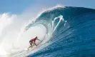  ?? Photograph: Tony Heff/WSL/Getty Images ?? Waving not drowning: Owen Wright shoots the tube at Oahu, Hawaii, 2019. He’s wearing a helmet, now increasing­ly popular among concussion-aware surfers.