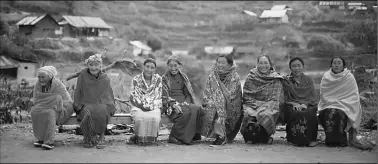  ?? Oinam Anand ?? Women in Lunghar village of Ukhrul in Manipur rest while returning home after casting their votes on Wednesday.