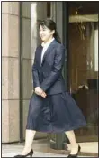  ?? ?? Japan’s Princess Aiko, the daughter of Emperor Naruhito and Empress Masako, walks out of the gate of the Japanese Red Cross Society as she begins to work on April 1. (AP)