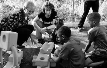  ?? CONTRIBUTE­D ?? Minister of Education and Youth Fayval Williams (left) and UNICEF Jamaica Country Representa­tive Olga Isaza (second left) interact with students at the McCam Child Care and Developmen­t Centre in Kingston, in observance of Global School Play Day on Wednesday.