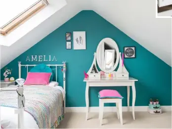  ??  ?? UNDER THE EAVESWith a vivid teal and bubblegum pink combo, balanced by plenty of clean white, Amelia’s bedroom echoes the intense colour statement in the other parts of the house. The walls are painted in Farrow &amp; Ball’s Vardo and the Hemnes dressing table and Ingolf stool are both from Ikea.