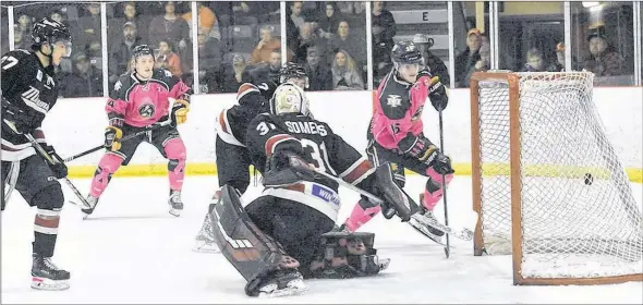  ?? TINA COMEAU ?? Mariners player Matt Barron looks on as teammate Andrew Martell scores the first goal of the Nov. 3 home game versus Mirimachi. Barron assisted on the goal along with Kaleb Boudreau.