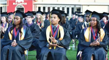  ?? ?? Kayla Chatman (front from left), Colin McKindra and Leah Randle are among White Hall honor graduates.