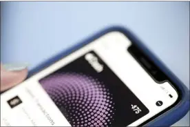  ?? AP photo ?? The Apple Pay app on an iPhone is shown Tuesday in New York. Experts warn that digital wallet services like Apple Cash and Venmo are prime targets for scammers.