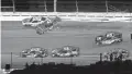  ?? JASEN VINLOVE/USA TODAY SPORTS ?? Matt Kenseth (42) and Jimmie Johnson (48) wreck Saturday during the Coke Zero Sugar 400 at Daytona Internatio­nal Speedway.