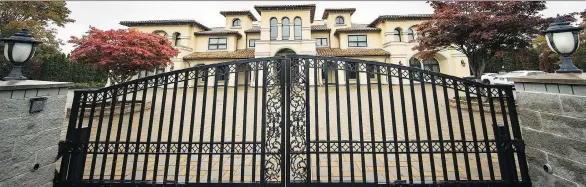  ?? FRANCIS GEORGIAN ?? This 22,000-square-feet mansion in Richmond is reportedly registered to Guo Tai Shi, who is alleged by casino investigat­ors to be a Chinese VIP gambler.