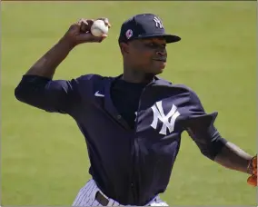  ?? GENE J. PUSKAR - THE ASSOCIATED PRESS ?? New York Yankees pitcher Domingo German delivers during the first inning of the team’s spring training baseball game against the Detroit Tigers in Tampa, Fla., Friday, March 5, 2021.