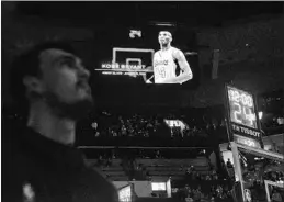  ?? BRANDON DILL/AP ?? A moment of silence is observed before the Grizzlies’ game against the Suns on Sunday.