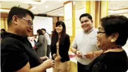  ??  ?? PTAA VP for inbound Danilo Cerdeña in a discussion with DOT Region VI director Helen Catalbas