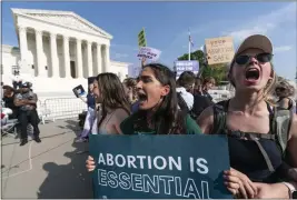  ?? ALEX BRANDON — THE ASSOCIATED PRESS FILE ?? Demonstrat­ors protest outside of the U.S. Supreme Court in Washington.