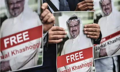  ?? Photograph: Ozan Köse/AFP/Getty Images ?? Protesters in Istanbul hold pictures of missing journalist Jamal Khashoggi on Monday.