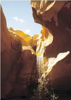  ??  ?? Occasional­ly, small waterfalls form after heavy rains. Below: Dome tents set up in private camping sites are often the night’s accommodat­ions.