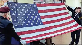  ?? / Contribute­d ?? On Nov. 8, Caris Healthcare and a team of people from local veterans groups and schools honored veterans at two nursing homes: NHC Healthcare in Fort Oglethorpe and NHC Healthcare in Rossville. From left: Larry Palmer and David Broyles of American Legion Post 95.