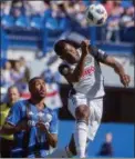  ?? FILE ?? Union center back Mark McKenzie, heading a ball against the Montreal Impact earlier this season, was back on the pitch Friday after leaving Wednesday’s 3- 1win over Chicago with a knee injury. The Union look to extend their unbeaten streak to five...