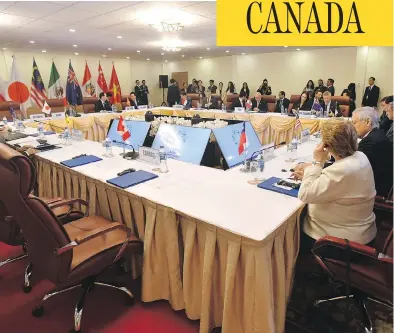  ?? MICK TSIKAS / AAP IMAGE VIA AP / THE CANADIAN PRESS ?? Prime Minister Justin Trudeau’s empty seat is seen at a Trans-Pacific Partnershi­p meeting at the APEC summit in Danang, Vietnam. No one doubts that the prime minister had reasons for refusing to sign onto the deal, but none of the motives that have...