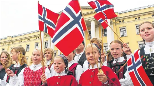  ??  ?? FLYING THE FLAG: Would Scots vote for independen­ce if they believed the country would become like Norway overnight, rather than doing so with hard graft? Picture: Getty Images. Steven Camley is away