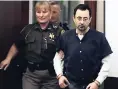  ?? AP ?? Dr Larry Nassar is escorted into court during the seventh day of his sentencing hearing yesterday in Lansing, Michigan.