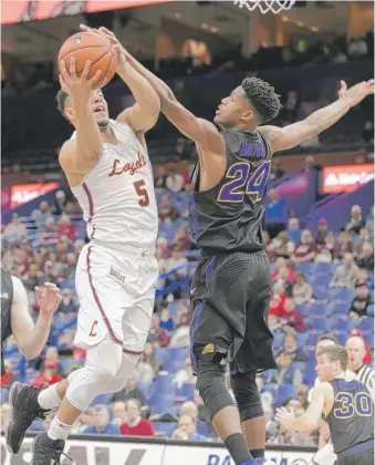  ?? | AP ?? Loyola’s Marques Townes, shooting over Northern Iowa’s Isaiah Brown, hit the game- clinching free throw.