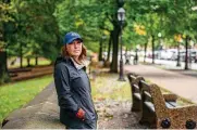  ?? ANDREW SENG/THE NEW YORK TIMES ?? Jessica Chrustic, whose dog Moose died from injuries a week after they were attacked by a seemingly unstable man with a stick in Prospect Park, stands just outside the popular park in Brooklyn on Oct. 5. The attack led to an acrimoniou­s debate, which largely played out on the Nextdoor app, that was shaped in part by the adjacent Park Slope neighborho­od’s reputation as both privileged and progressiv­e.