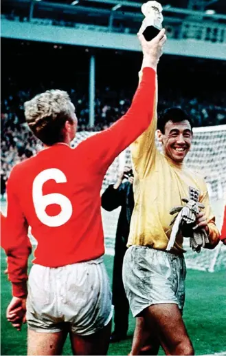  ??  ?? Trophy: Gordon Banks, right, with Bobby Moore after 1966 World Cup win