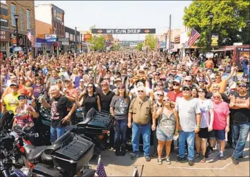  ?? Scott Olson Getty Images ?? HEALTH OFFICIALS in South Dakota have reported 63 coronaviru­s cases among residents who attended the Sturgis Motorcycle Rally this month. The festival’s full fallout won’t be known for weeks, one expert says.