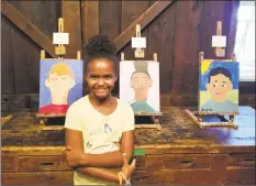  ?? Contribute­d photo ?? Hamilton Avenue School fourth-grader Ava Robinson with her self portrait. Hamilton Avenue students have been in partnershi­p with the Greenwich Historical Society for 11 years.