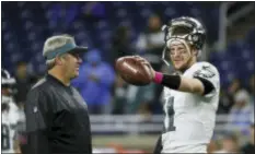  ?? THE ASSOCIATED PRESS FILE ?? Although the front office hesitates to give Doug Pederson carte blanche to name his own roster, quarterbac­k Carson Wentz threw his support behind the first-year coach during a season fraught with adversity.