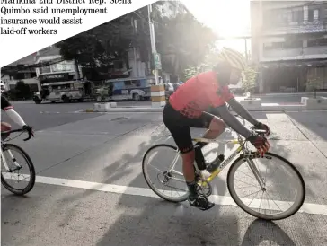  ?? PHOTOGRAPH BY RIO DELUVIO FOR THE DAILY TRIBUNE ?? Seize day Cyclists take on the road in the morning of Thursday which was the first sunny day for a while.