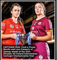  ?? ?? CAPTAINS RUN: Cork’s Finola Neville and Lisa Casserly of Galway ahead of the Glen Dimplex All-Ireland Intermedia­te Camogie Championsh­ip final