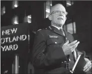  ?? AP/TIM IRELAND ?? Assistant Police Commission­er Mark Rowley delivers a statement Friday outside New Scotland Yard in London after a homemade bomb planted in a rush-hour subway car exploded in the city, injuring 29 people.