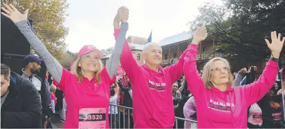 ?? Picture: AAP IMAGE ?? Malcolm Turnbull, his wife Lucy (right) and CEO of the National Breast Cancer Foundation Sarah Hoskins at the Mother's Day Classic in Sydney.