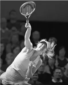  ??  ?? Russia’s Maria Sharapova serves to Estonia’s Anett Kontaveit during their quarterfin­al match at the WTA Porsche Tennis Grand Prix in Stuttgart, southweste­rn Germany. — AFP photo