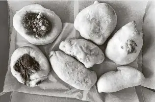  ?? Paul Stephen / Staff ?? Along with traditiona­l kolaches, a new bakery offers ones stuffed with puro San Antonio flavors.