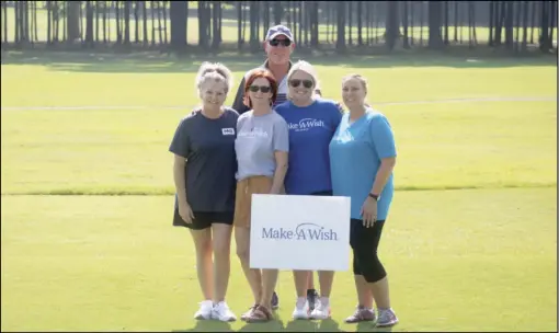  ?? Photo Submitted ?? Pictured, Marla Hunter of Malvern National Bank, Beverly Black, Anna Simpson, and Leslie Humphrey with Make-A-Wish Mid-South, and Rodney Allen of Malvern Country Club.